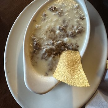El Tequila - Queso (melted cheese) and carne (ground beef) - Mexican Near Me - Milledgeville, Georgia El Tequila - Queso (melted cheese) and carne (ground beef) - Mexican Near Me - Milledgeville, Georgia