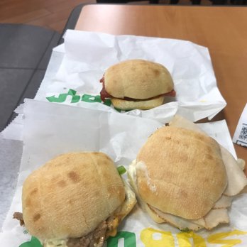 Subway - three sandwiches sitting on paper on a table - Sandwiches Near Me - Shreveport, Louisiana Subway - three sandwiches sitting on paper on a table - Sandwiches Near Me - Shreveport, Louisiana