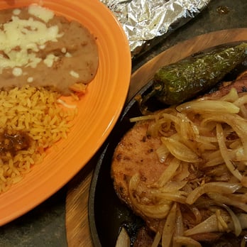 El Maguey - Casuelon plate Steak, pork chop, chicken breast. Comes with Rice, Beans & 3 tortillas. I already smothered the rice in extra Hot Hot Salsa!! - Mexican Near Me - Maryville, Missouri El Maguey - Casuelon plate Steak, pork chop, chicken breast. Comes with Rice, Beans & 3 tortillas. I already smothered the rice in extra Hot Hot Salsa!! - Mexican Near Me - Maryville, Missouri