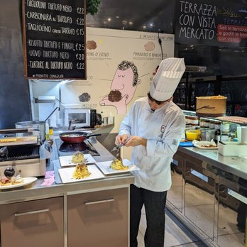 Mercato Centrale - Shaving truffles on to pasta - Food Court Near Me - Florence, FI