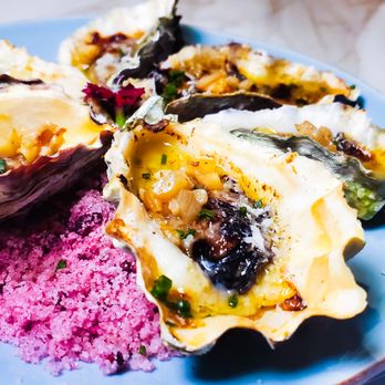 Falling Rabbit - Oysters over pink salt - New American Near Me - Duluth, Georgia