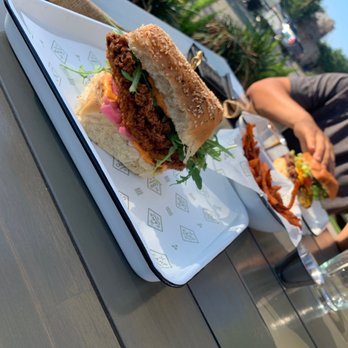 Camp Outpost - Chicken sandwich, burger sweet potato fries - New American Near Me - San Antonio, Texas Camp Outpost - Chicken sandwich, burger sweet potato fries - New American Near Me - San Antonio, Texas