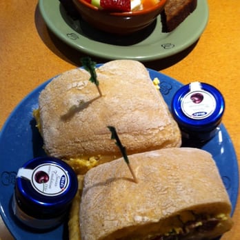 Wildflower - Sausage and egg sandwich and small fruit salad. - Sandwiches Near Me - Chandler, Arizona