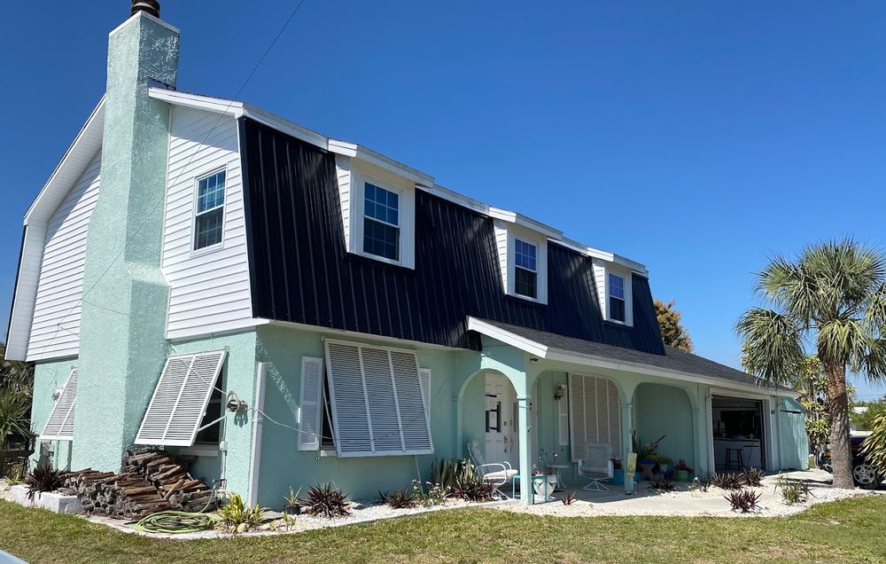 Slide of Whitby Roofing