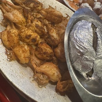 Florida's Seafood Bar & Grill - Plate 2 of Florida Coast Combo - Shrimp and baked potato - Seafood Near Me - Cocoa Beach, Florida Florida's Seafood Bar & Grill - Plate 2 of Florida Coast Combo - Shrimp and baked potato - Seafood Near Me - Cocoa Beach, Florida