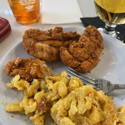 Mac n cheese and chicken strips from the soul food joint. Mac n cheese and chicken strips from the soul food joint.