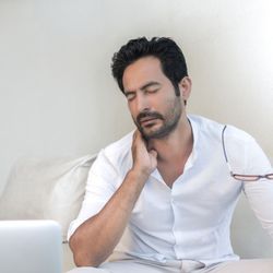 Slovin Chiropractic Center - Patient with headache and neck pain