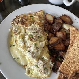 Chicken sausage omelet that wasn't hot and tasted bad. The potato's were decent though. Chicken sausage omelet that wasn't hot and tasted bad. The potato's were decent though.