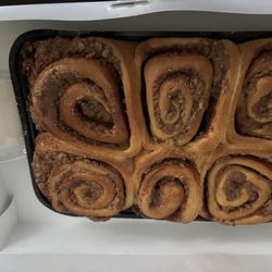 Bread For The Masses - Cinnamon rolls with container of icing