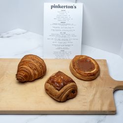 L - R: Croissant, Chocolate Croissant, Apple, Quince & Cheese Danish