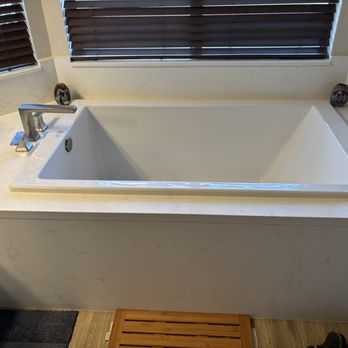Legacy Construction & Landscape - New tub and surround - Flooring Near Me