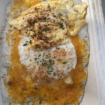 Biscuit Bitch - Gritty cheesy bitch (eggs over medium) - Breakfast & Brunch Near Me - Seattle, Washington