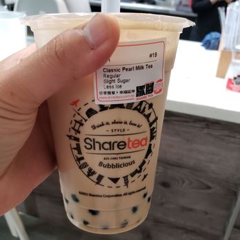 Sharetea - a hand holding a cup of bubble tea - Bubble Tea Near Me - Vancouver, British Columbia Sharetea - a hand holding a cup of bubble tea - Bubble Tea Near Me - Vancouver, British Columbia