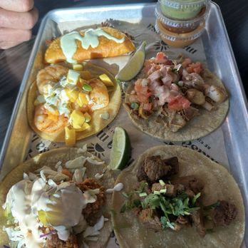 Masa Masa - Hot chicken and garlic shrimp and Birria on the left chicken and Carne Asada on the right. Sauces were delicious. Asada was boring. - Tacos Near Me - Roseville, California