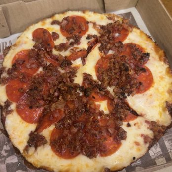 Noventa Millas - I got a pepperoni and bacon pizza - Juice Bars & Smoothies Near Me - Tampa, Florida