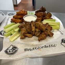 Chuck E. Cheese - X-Large Wings - they look really good but didn't taste good. The flats were ok, the drums were undercooked and fatty.