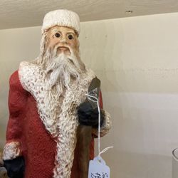 Camas Antiques - Scary Santa in the basement.