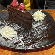 Photo of Cafe Bastille - San Francisco, CA, United States. Chocolate ganache cake