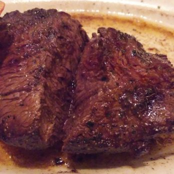 Ruth's Chris Steak House - Mid rare steak tossed back on the grill after cutting it in half. Well done now. Ugggg - Steakhouses Near Me - Cherokee, North Carolina
