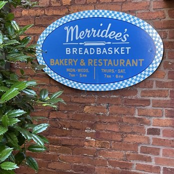 Merridee's Breadbasket - a blue sign on a brick wall - Bakeries Near Me - Franklin, Tennessee