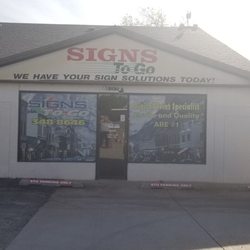 Signs To Go - We are behind the UPS store, you can't miss us!!!
