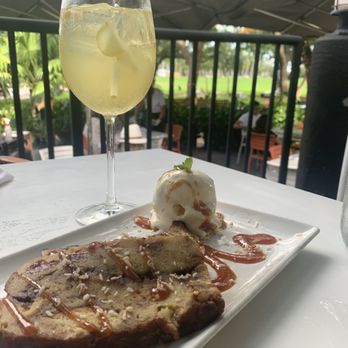 Glass & Vine - Bread Pudding enjoyed with a white sangria - New American Near Me - Miami, Florida Glass & Vine - Bread Pudding enjoyed with a white sangria - New American Near Me - Miami, Florida