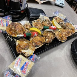 a tray of oysters on a table