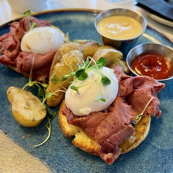 OEB Breakfast Co. - Brisket eggs Benedict with sauce on the side and gluten free fingerling potatoes (you have to request these specifically). - Breakfast & Brunch Near Me - North Vancouver, British Columbia OEB Breakfast Co. - Brisket eggs Benedict with sauce on the side and gluten free fingerling potatoes (you have to request these specifically). - Breakfast & Brunch Near Me - North Vancouver, British Columbia