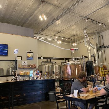 The Pantown Brewing Company - two men sitting at a table - Breweries Near Me - Saint Cloud, Minnesota