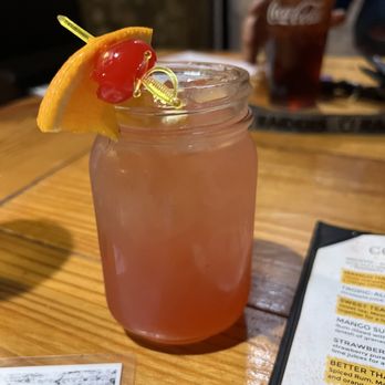 Melt - a drink in a mason jar on a table - Pizza Near Me - Myrtle Beach, South Carolina Melt - a drink in a mason jar on a table - Pizza Near Me - Myrtle Beach, South Carolina