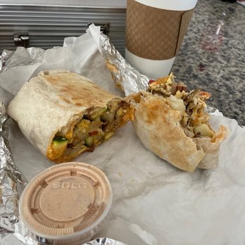Joe On the Go Cafe - Breakfast Burrito and Hot Cappuccino The sauce they provide is amazing idk what it is but I need more - Coffee & Tea Near Me - Merced, California