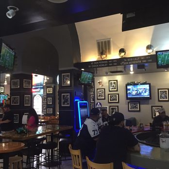 Tailgate Tavern - people sitting at the bar - American Near Me - Arlington, Texas