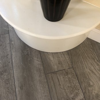 Alvarez Tile & Wood Installations - Wood tile cut around stairs - Flooring Near Me Alvarez Tile & Wood Installations - Wood tile cut around stairs - Flooring Near Me