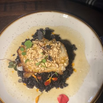 MIA Kitchen & Bar - Cashew crusted Chilean seabass with wild black rice and lemon purée - New American Near Me - Delray Beach, Florida
