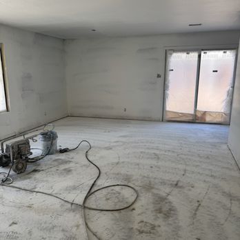 Pree's Professional Painting - The cement slabs, (ready for laminate flooring) before they painted the baseboards without using drop cloths. - Painters Near Me - San Francisco, California Pree's Professional Painting - The cement slabs, (ready for laminate flooring) before they painted the baseboards without using drop cloths. - Painters Near Me - San Francisco, California