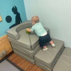 Room to Bloom - My 1 yr old son climbing the baby gym equipment