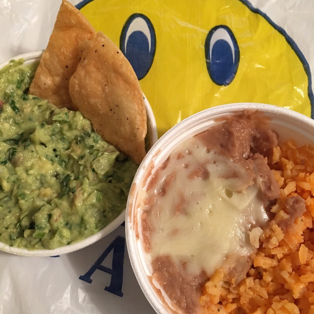 Simon Tacos - Fresh guacamole and chips and a side of rice and beans - Tacos Near Me - Chicago, Illinois Simon Tacos - Fresh guacamole and chips and a side of rice and beans - Tacos Near Me - Chicago, Illinois