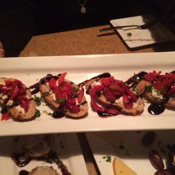 Tapalaluna - Roasted red pepper and Boursin Bruchetta - Tapas Bars Near Me - DeKalb, Illinois Tapalaluna - Roasted red pepper and Boursin Bruchetta - Tapas Bars Near Me - DeKalb, Illinois
