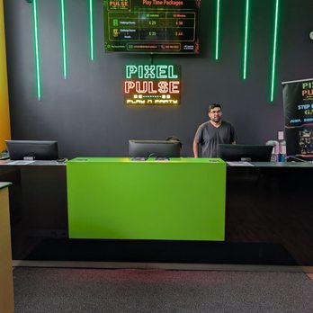 Elite Experience at Pixel Pulse Playzone - Check-in desk - Escape Games Near Me - Vaughan, Ontario Elite Experience at Pixel Pulse Playzone - Check-in desk - Escape Games Near Me - Vaughan, Ontario