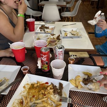 Tropical Taste Restaurant - The finished dishes of food and the family killing it - Puerto Rican Near Me - San Juan, Puerto Rico
