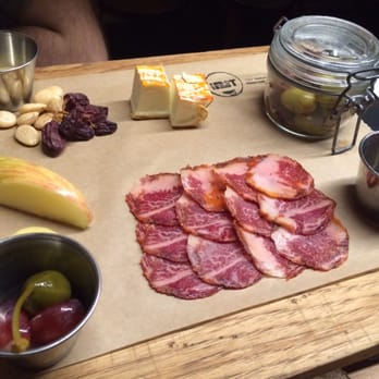 Manhattan Beach Post - "Best pork in the world" cured meat with olives, cheese, almonds and apples. Pork melts in your mouth! - New American Near Me - Manhattan Beach, California