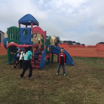 Elves Christmas Tree Farm & Pumpkin Patch - Playground next to picnic tables for kids to play while others are finishing lunch. - Christmas Trees Near Me - Denison, Texas