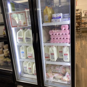Carmen's Deli - a refrigerator with milk and milk - Delis Near Me - Haddon Heights, New Jersey