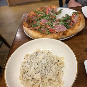 Cheese Wheel Pasta & Pizza - Cheese Wheel Fettuccine & prosciutto E Rucola - Pizza Near Me - Clearwater, Florida Cheese Wheel Pasta & Pizza - Cheese Wheel Fettuccine & prosciutto E Rucola - Pizza Near Me - Clearwater, Florida