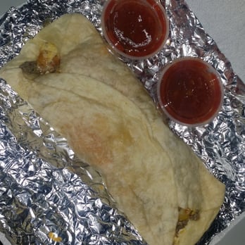 Juan's Burrito Express - Potato, sausage, egg and cheese burrito with picante sauce! - Mexican Near Me - Fort Worth, Texas Juan's Burrito Express - Potato, sausage, egg and cheese burrito with picante sauce! - Mexican Near Me - Fort Worth, Texas