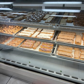 Shamrock Donuts - a display case filled with different types of donuts - Donuts Near Me - Arnold, Missouri