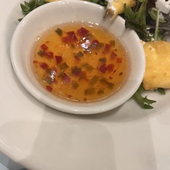 Town Tavern - Fried goat cheese with dipping sauce (including a piece I had taken a bite from) - Sports Bars Near Me - West Jefferson, North Carolina