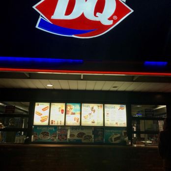 Dairy Queen Ltd Brazier - a man standing in front of a dairy queen - Burgers Near Me - Enfield, Connecticut