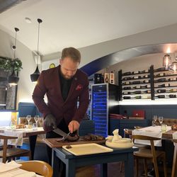 MeatEater Steak&Wine - David slicing our steak table side.