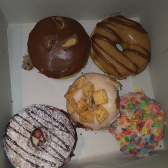 Friendly Donuts - PB cup, maple chocolate, cereal and strawberry banana Nutella - Donuts Near Me - Orange, California Friendly Donuts - PB cup, maple chocolate, cereal and strawberry banana Nutella - Donuts Near Me - Orange, California